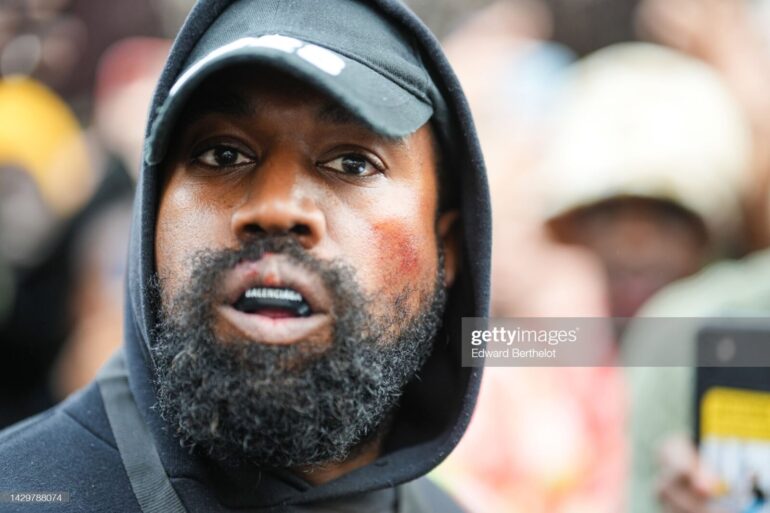 A man with a beard and a hat on